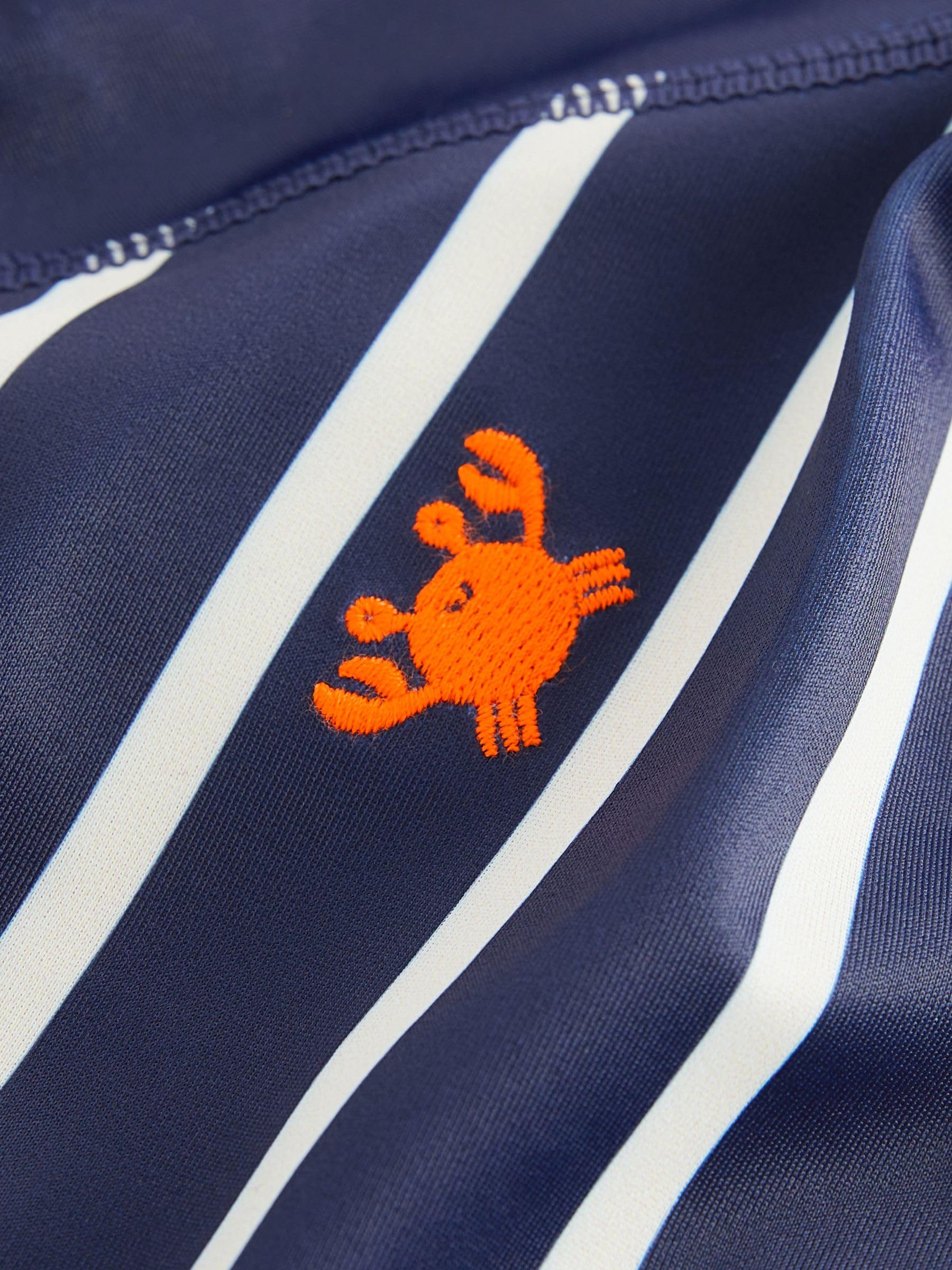 Next costume intero bimbo anti-UV navy stripe 12-18m