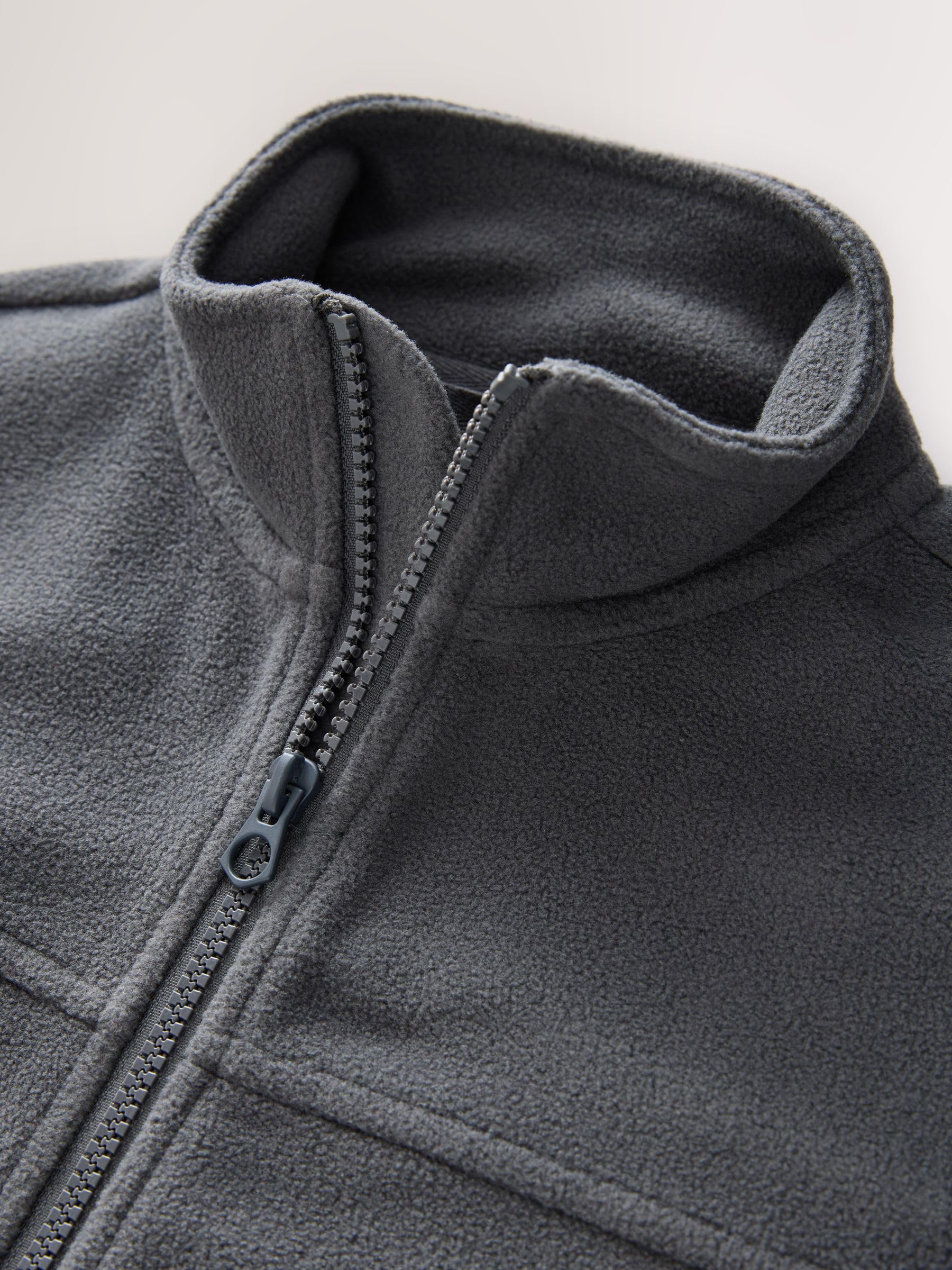 Next giacca pile ragazzo zip tasche taglia 104 grigia