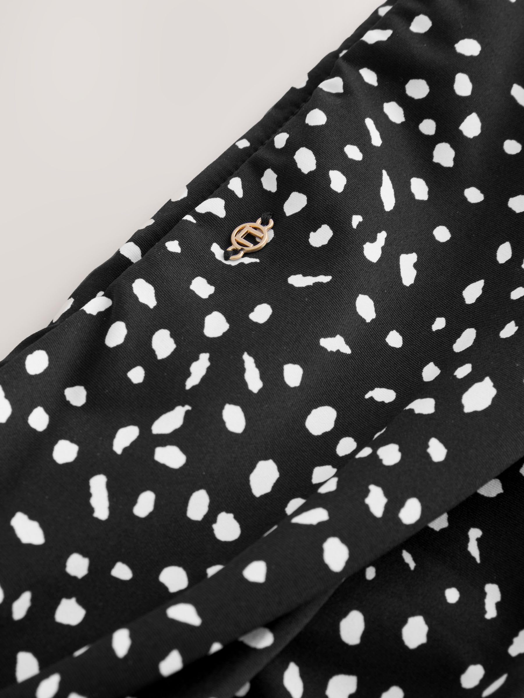 Next slip bikini risvolto taglia 40 nero fantasia